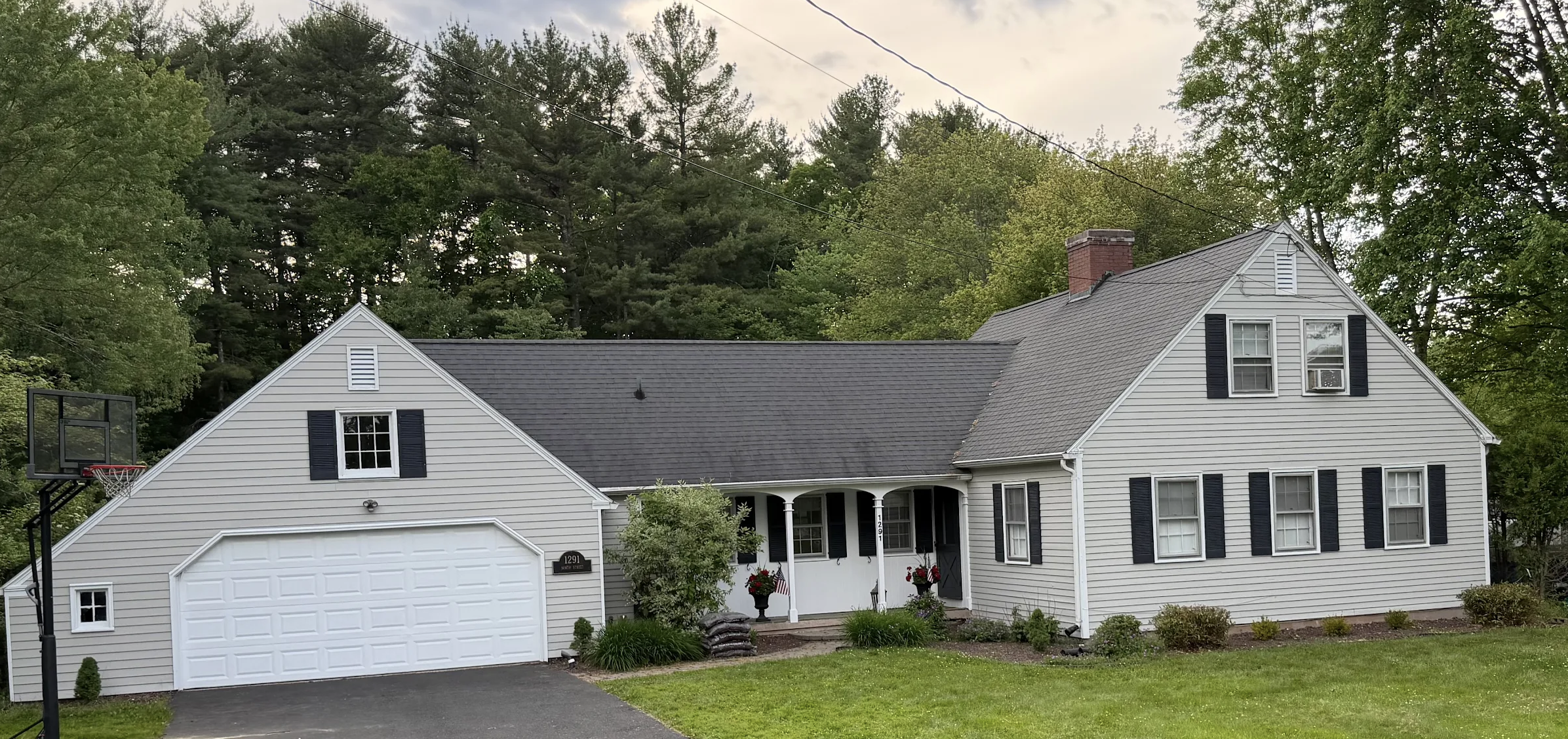 Professional exterior painting project in Enfield CT by Blue Diamond Painters
