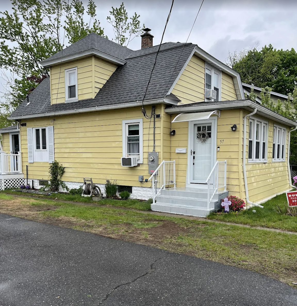 Before aluminum siding exterior painting project in Enfield CT by Blue Diamond Painters